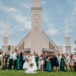 Family photo of LDS wedding outside the Lima Peru Temple.
